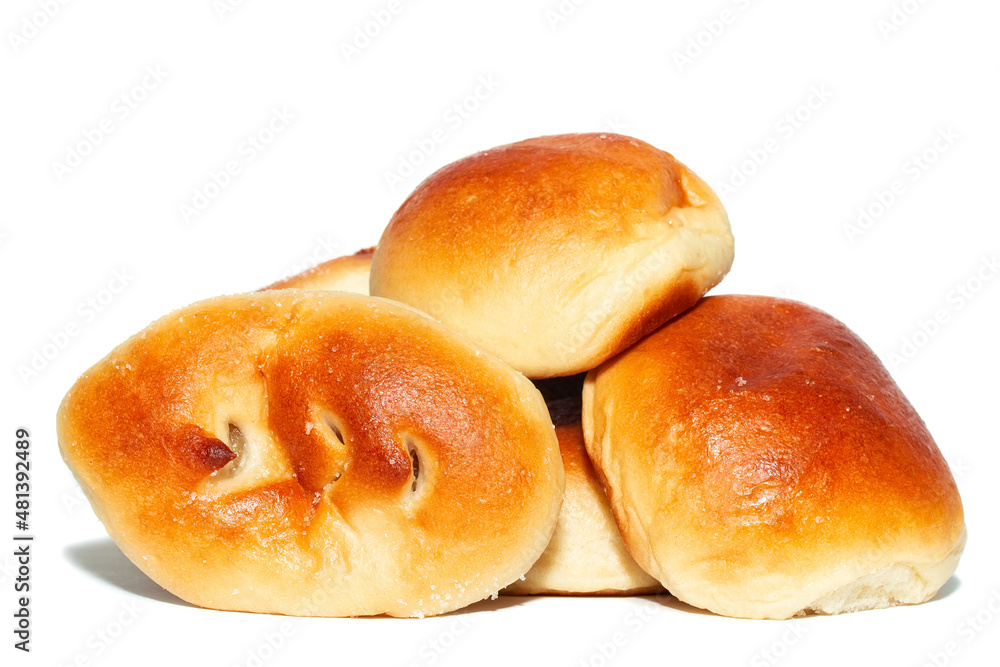 Fresh baked tasty sweet brioches, buns, loaves, bread isolated on white background