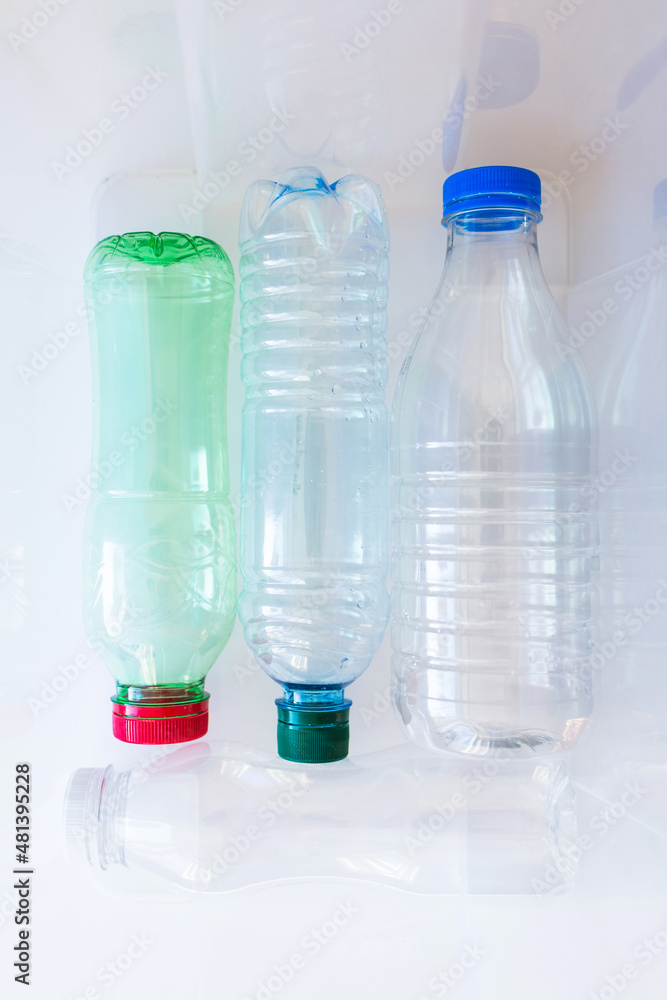 empty plastic bottles in garbage collection container for recycling. concept of ecology and environmental protection empty plastic bottles in garbage collection container for recycling. concept of ecology and environmental protection