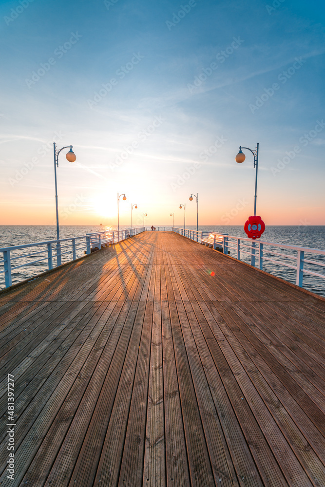 sunset on the pier in Jurata