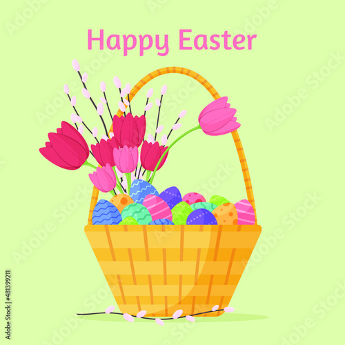 Easter basket with pink tulips, eggs and pussy willow. Happy Easter greating card or background