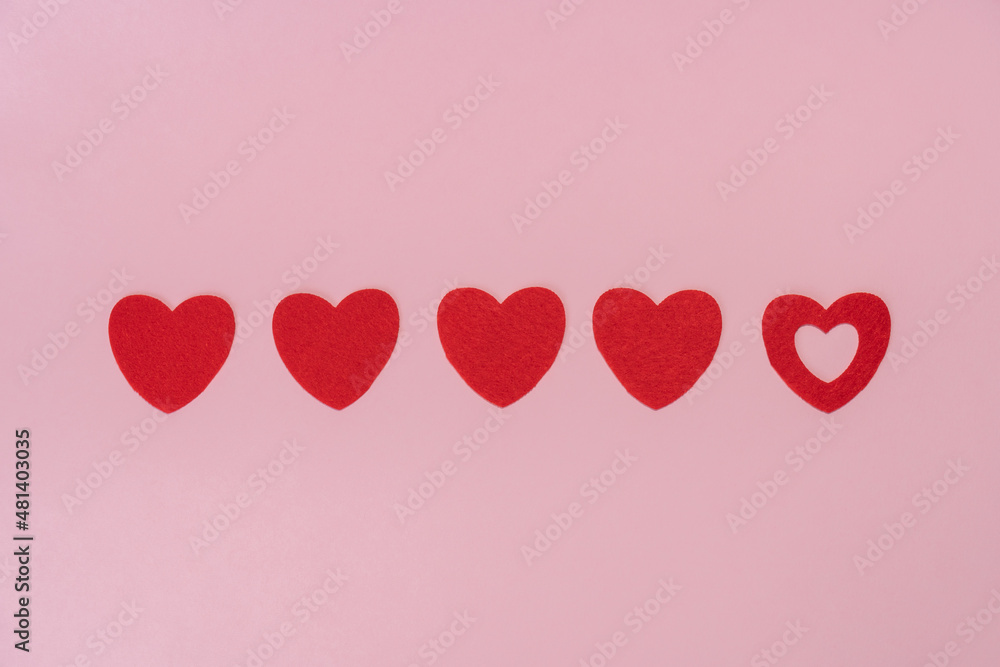 Felt hearts on pink background. Love, romance, Valentines Day concept