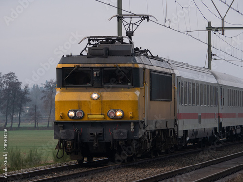 Dutch yellow train with German wagons