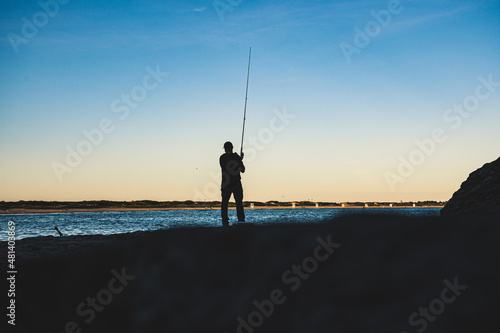 Fisherman casting at Second Beach, Rhode ISland