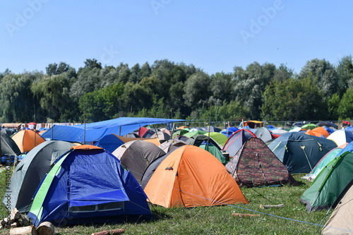 Many touristic tents at the campsite placed very close to each other. © kyrychukvitaliy