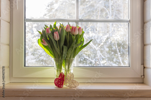 Valentines Day or 8 March Women's Day greeting card, spring bouquet of tulips on the windowsill