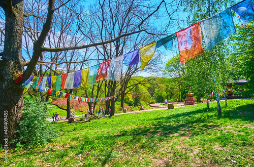 The colorful prayer flags in Tibetan Garden of Kyiv Botanical Garden, Ukraine photo