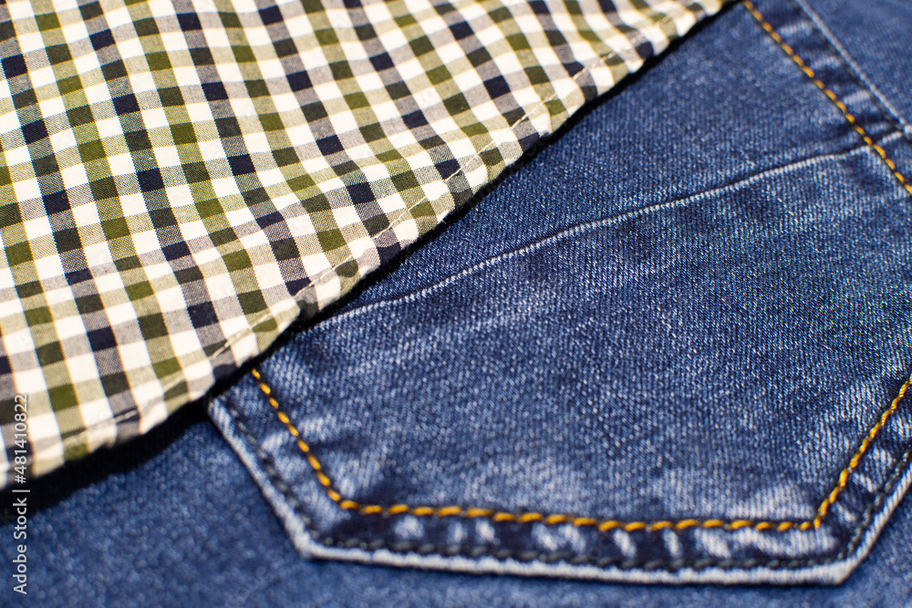 background of blue jeans and plaid shirt background of blue jeans and plaid shirt