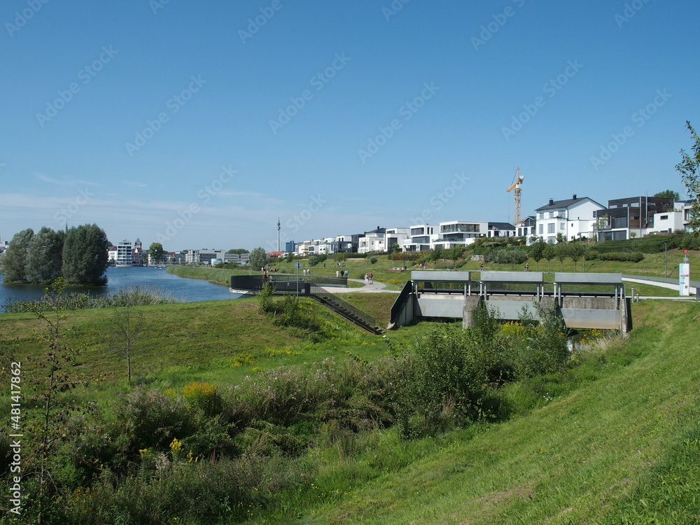 Circular path and bridge over the Emscher at Phoenix Lake in the Dortmund suburb of Hoerde, North Rhine-Westphalia, Germany