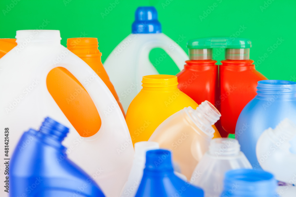 Group of empty plastic bottles of various sizes and colors. Detergent