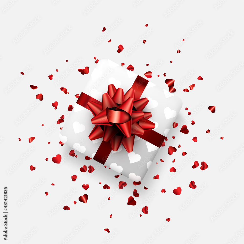 White gift box with beautiful red bow. Red foil confetti. Valentine's day. White gift box with beautiful red bow. Red foil confetti. Valentine's day.
