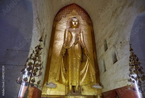 A Golden Buddha Statue at Bagan, Myanmar's Ananda Temple photo