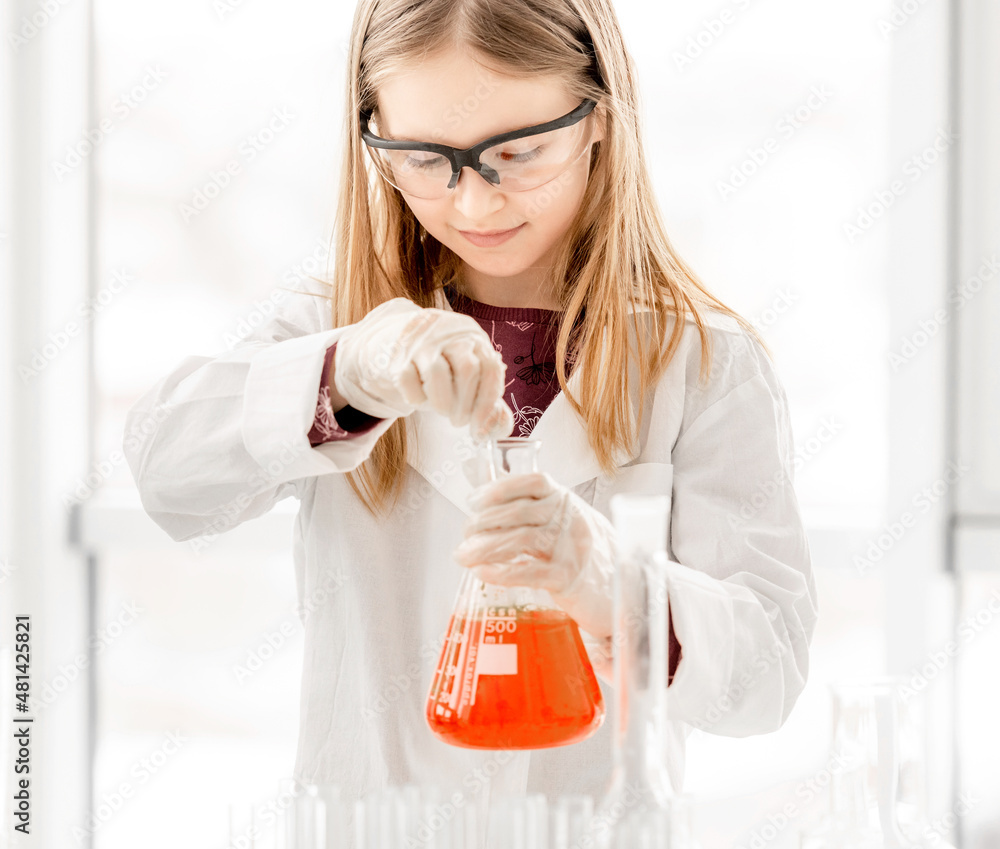 Girl on chemistry lesson Girl on chemistry lesson
