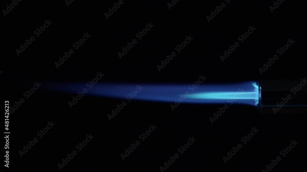 Butane Gas Flame and nozzle against black from a butane torch burner. 50 FPS. Blue and yellow flame. Element for VFX and Compositing, e.g. as rocket propulsion, spaceship drive or welding flame