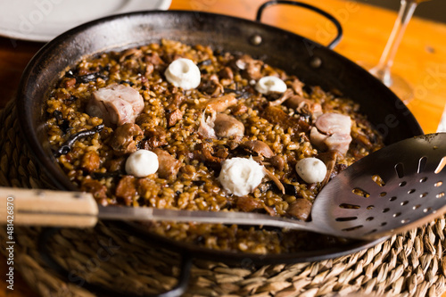delicious Catalan mountain rice with mushrooms and pork feet