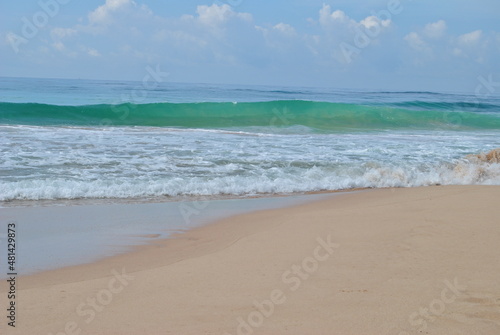 The sea wave. Beach  sea  palm trees  ocean. Sri Lanka. Blue lagoon. Beautiful beach.