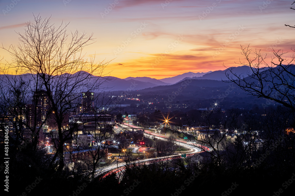 Downtown Asheville at dusk and with a beautiful sunset in winter