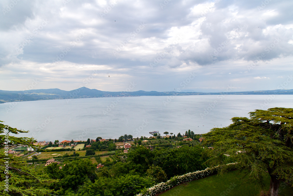 Landscape of Lake of Bracciano, Lazio, Italy, in  a cloudy summer day
