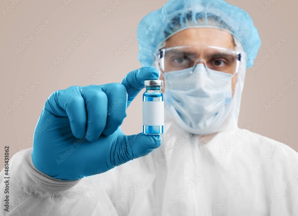 Doctor or scientist holding liquid vaccines booster. virus covid-19 coronavirus,