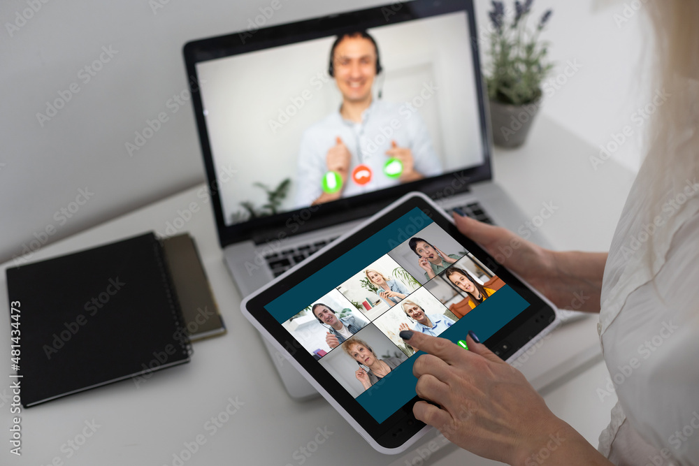Doctor on video conference or teleconference, discussing on case study