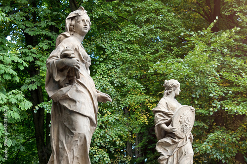 Sandstone statues in the Saxon Garden, Warsaw, Poland. Made before 1745 by anonymous Warsaw sculptor under the direction of Johann Georg Plersch photo