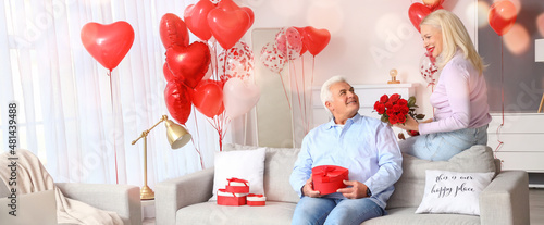 Happy mature couple celebra...