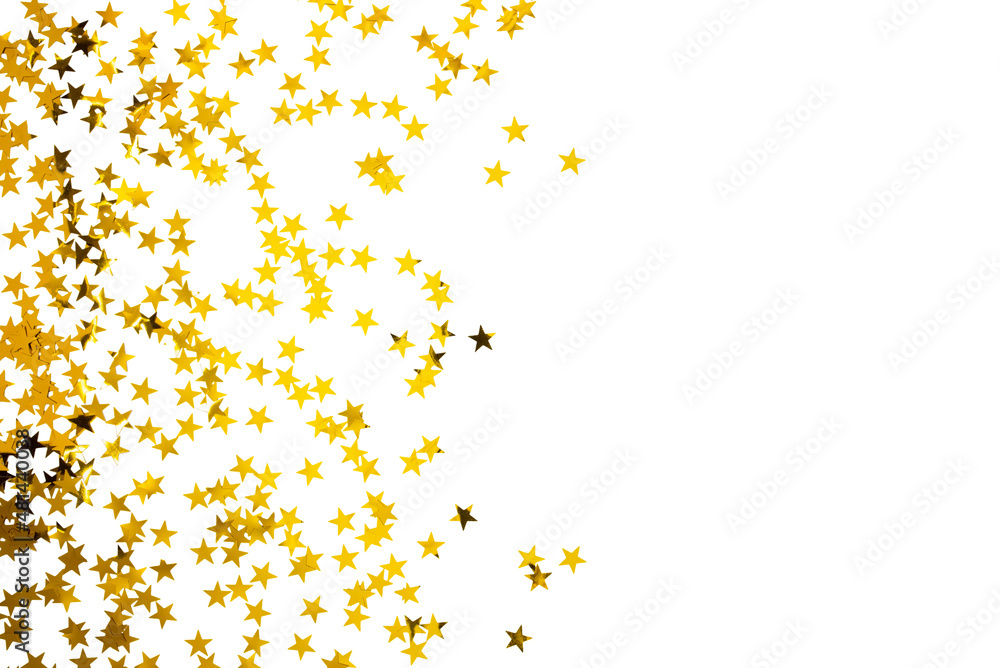 Golden confetti in the form of stars isolated on white background. Festive day backdrop. Flat lay style with minimalistic design. Template for banner or party invitation
