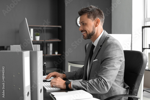 Handsome businessman workin...