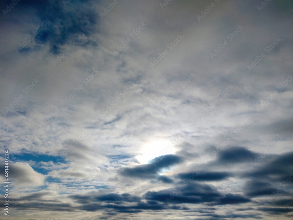 The blue sky was covered with gray clouds. Cloudy sky texture. 
