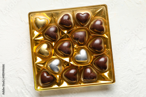 Box with tasty heart-shaped...