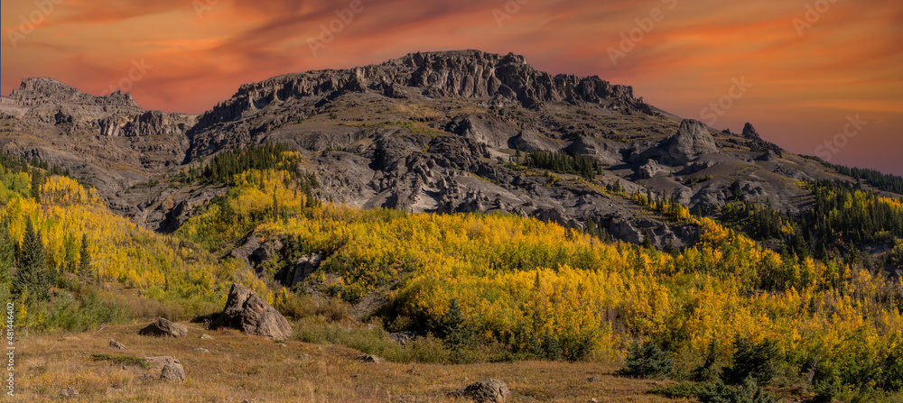 A panorama of spen trees and rock hoodoos in the San Juan mountains near Ouray colorado