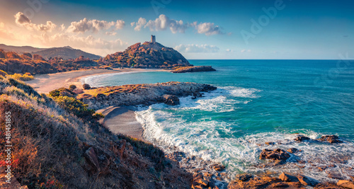 Superb sunrise on popular tourist destination - Acropoli di Bithia with Torre di Chia tower on background. Spectacular morning view of Sardinia island, Italy, Europe. Traveling concept background