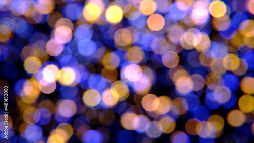 Realistic 3D illustration of the blue and yellow shining light particles bokeh rendered as background