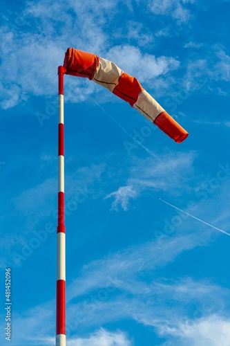 colorful windsock or windbag, wind direction indicator. durable red and white textile tube