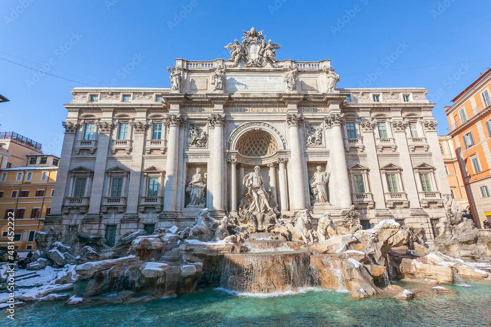 Trevi Fountain with snow, the largest Baroque fountain and one of the most beautiful fountains in the world.