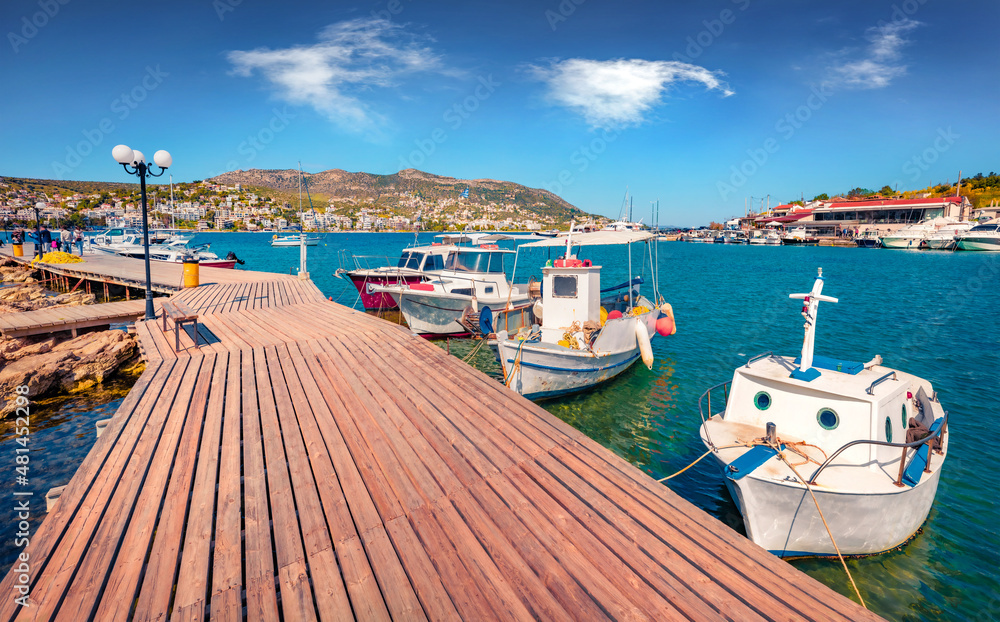 Captivating spring view of Porto Rafti port. Sunny morning seascape of Aegean sea, Greece, Europe. Traveling concept background.
