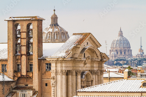 Photography Roof of Rome and Saint Peter dome with snow