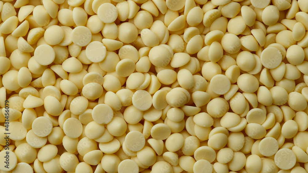 Chocolate. White chocolate chips top view Chocolate. White chocolate chips top view