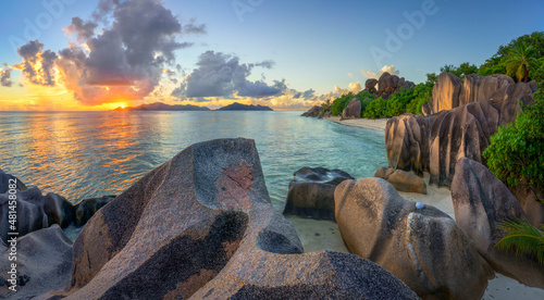 sunset at tropical beach anse georgette on praslin on the seychelles