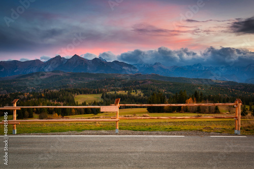 Beautiful sunset on the meadow under the Tatra Mountains at autumn. Poland photo