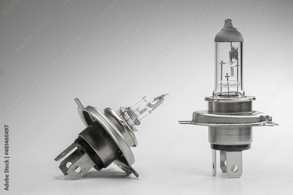 Two bulbs H4 and H7 for car on white grey. One lamp is broken. Two bulbs H4 and H7 for car on white grey. One lamp is broken.