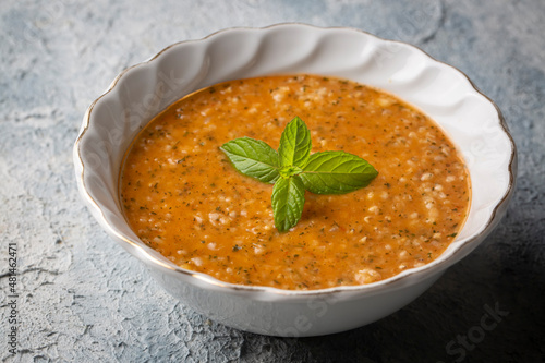 Traditional delicious Turkish soup; Turkish name; Tarhana or Ezogelin corbasi photo