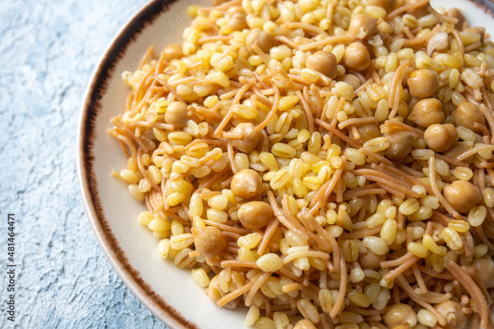 Traditional delicious Turkish food; bulgur pilaf with chickpea (Turkish name; nohutlu bulgur pilavi) Traditional delicious Turkish food; bulgur pilaf with chickpea (Turkish name; nohutlu bulgur pilavi)