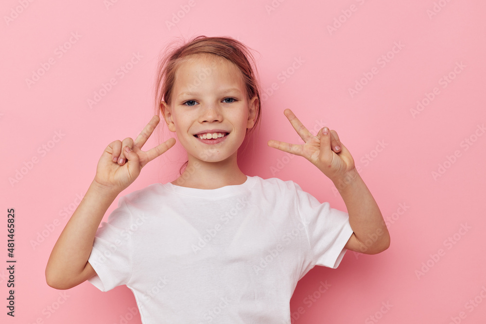 cute girl in a white t-shirt smile childhood unaltered cute girl in a white t-shirt smile childhood unaltered