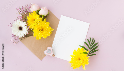 Craft envelope with delicate flowers. Place for text