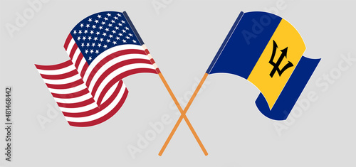 Foto Crossed and waving flags of the USA and Barbados