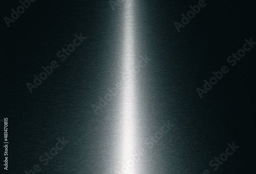 Texture of brushed metal surface. Abstract background of light shining on steel plate.