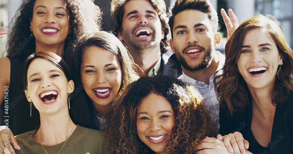 We're positive about business. Cropped shot of a group of happy businesspeople standing in their workplace lobby. We're positive about business. Cropped shot of a group of happy businesspeople standing in their workplace lobby.