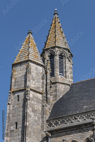 Collegiate Church Saint-Aubin at Psalette square in medieval town of Guerande. Current architecture of Saint-Aubin Church dates from XV - XVI century. Guerande, Loire-Atlantique, Western France. photo