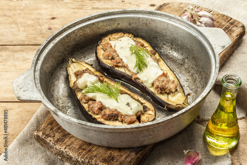 Stuffed eggplant ready to eat with ground meat, vegetables, and spices