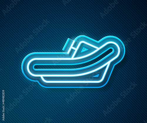 Glowing neon line Rafting boat icon isolated on blue background. Inflatable boat with paddles. Water sports, extreme sports, holiday, vacation. Vector
